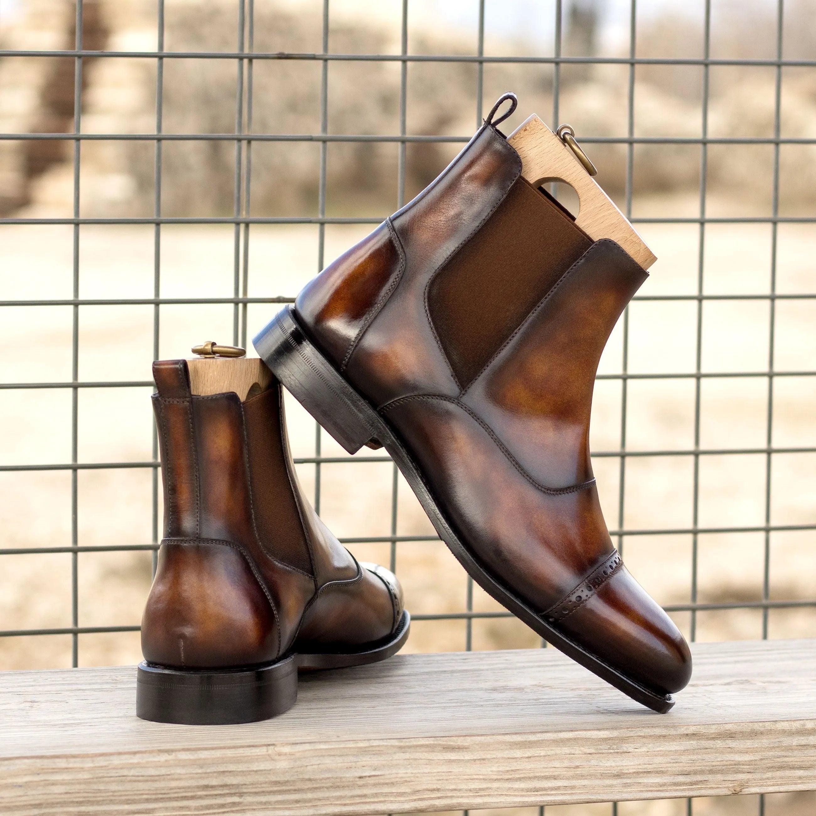 Pair of brown Willy Patina Chelsea rounded toe Chelsea boots