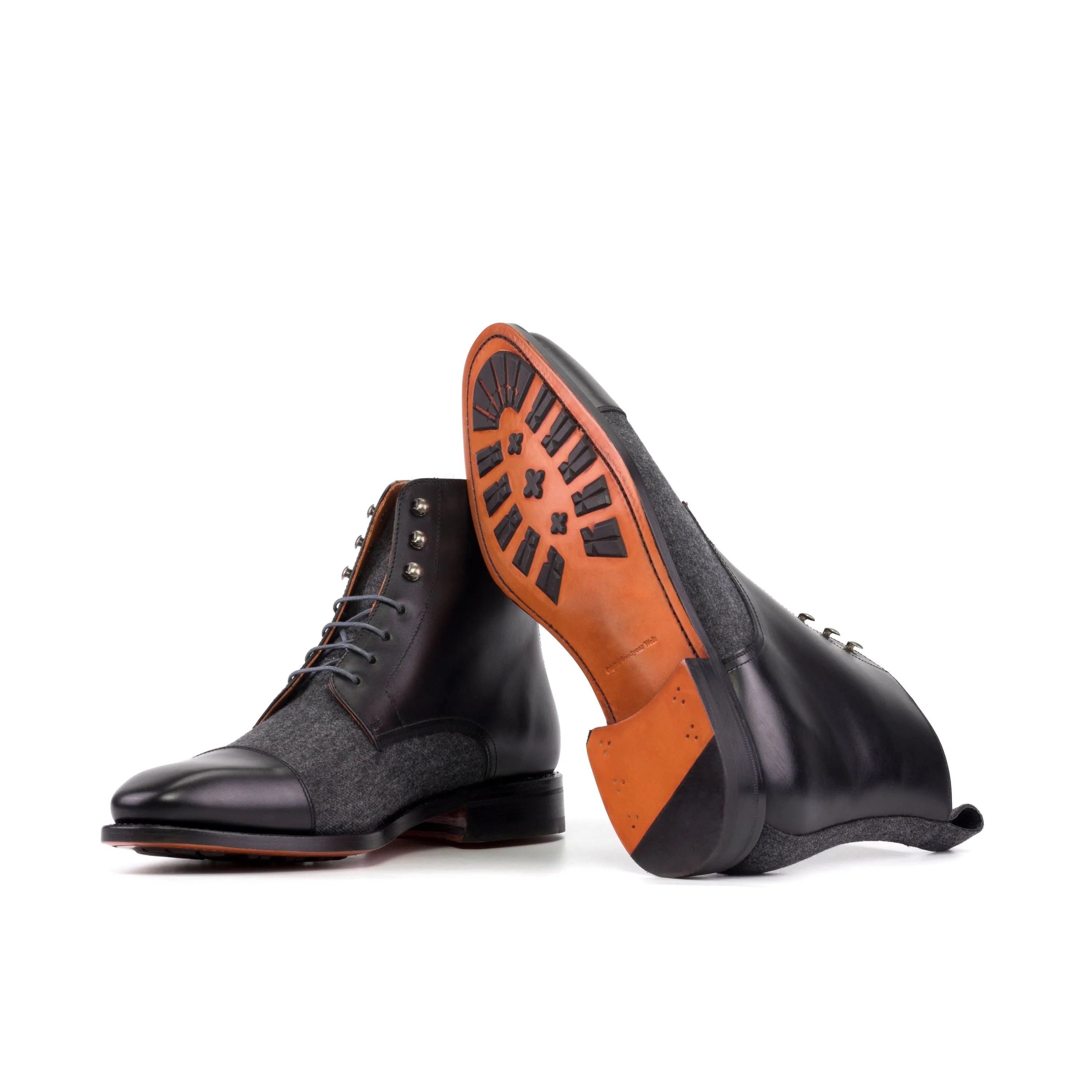 Zenobia jumper boots in black leather and tweed lace-up design